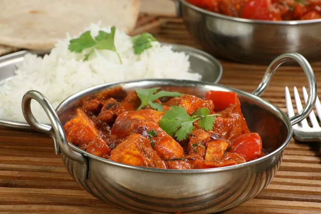 A rich curry served with basmati rice and naan bread